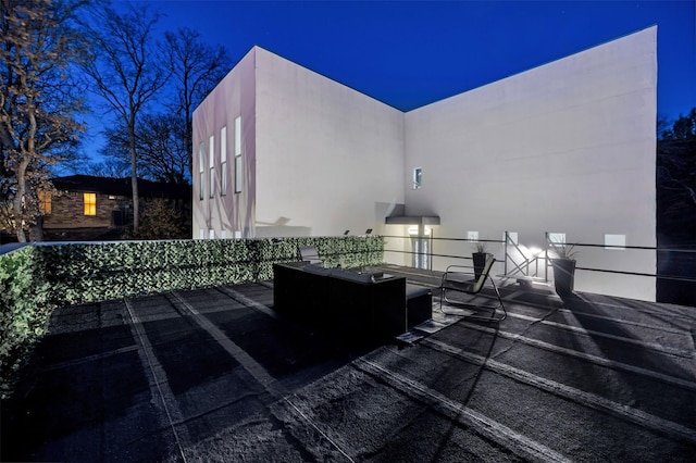 view of patio at twilight