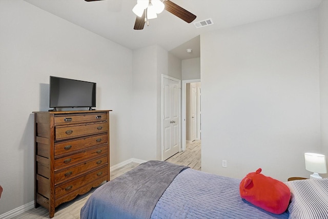 bedroom featuring ceiling fan and light hardwood / wood-style flooring