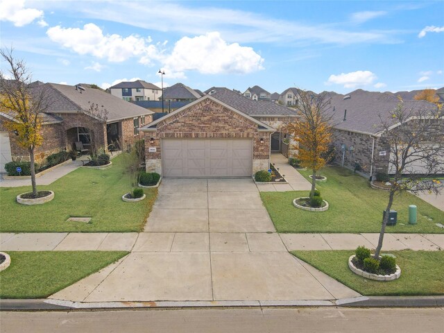 single story home featuring a garage and a front yard