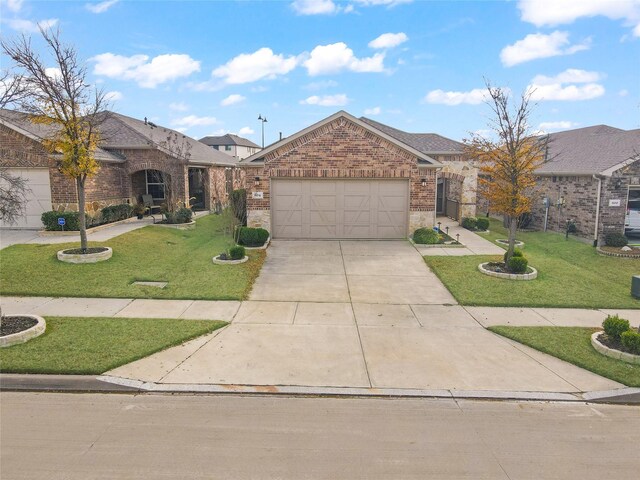 ranch-style house with a garage and a front yard