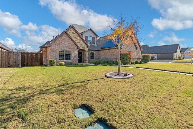 view of front of home with a front lawn