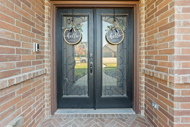 entrance to property featuring french doors