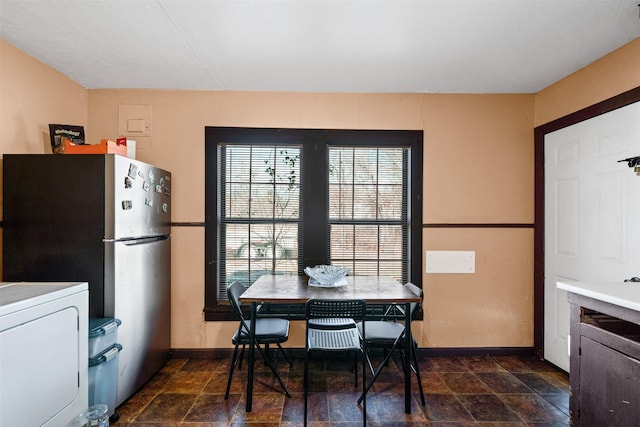 kitchen featuring stainless steel refrigerator