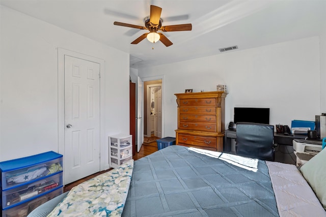 bedroom featuring dark wood-type flooring and ceiling fan