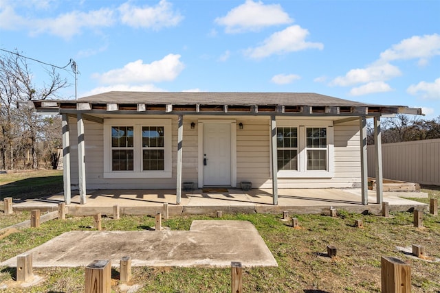 view of front of house with a patio area