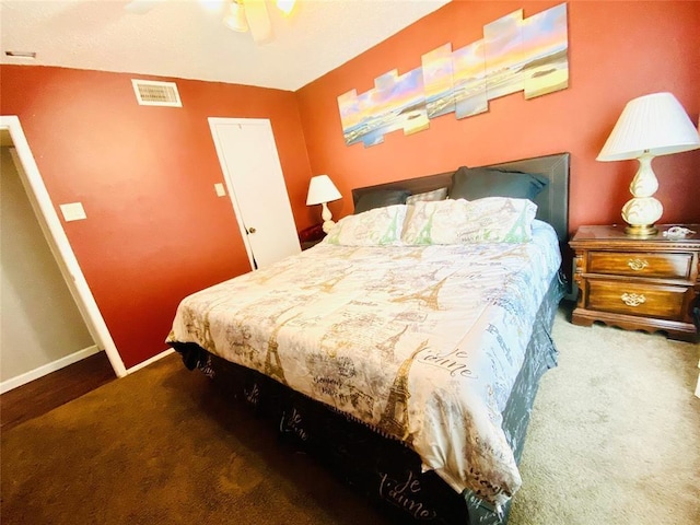 carpeted bedroom with ceiling fan