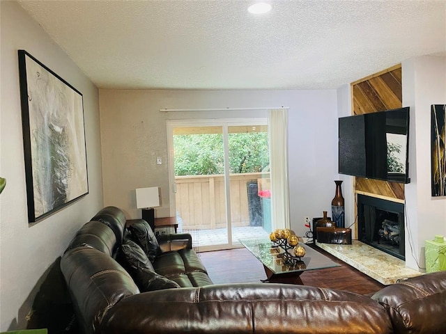 living room featuring a textured ceiling