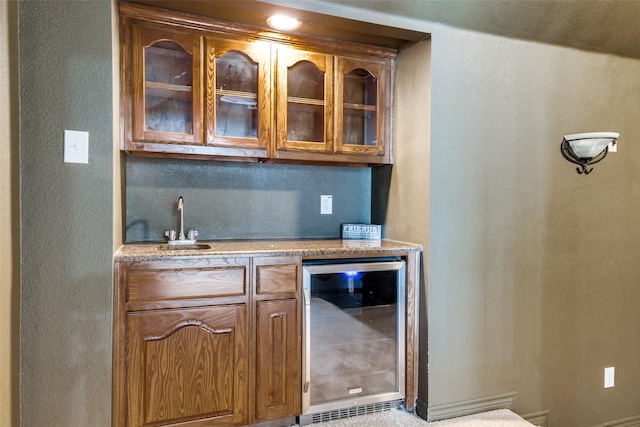 bar featuring sink and wine cooler