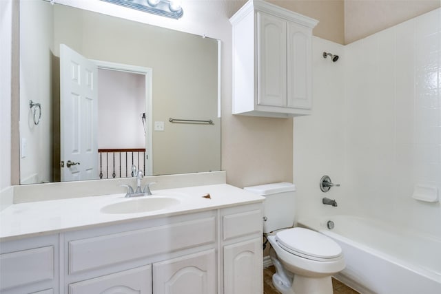 full bathroom featuring shower / bath combination, vanity, and toilet