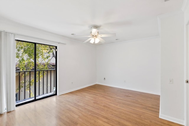 empty room featuring ceiling fan, light hardwood / wood-style floors, and ornamental molding