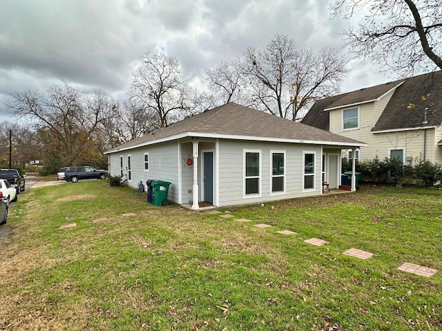 view of home's exterior with a lawn