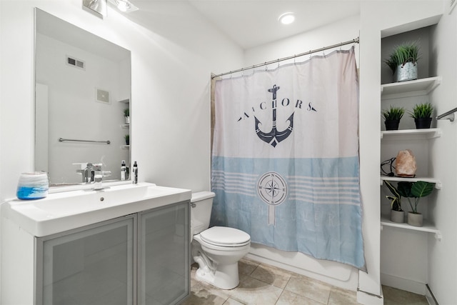 full bathroom featuring tile patterned flooring, vanity, shower / tub combo, and toilet