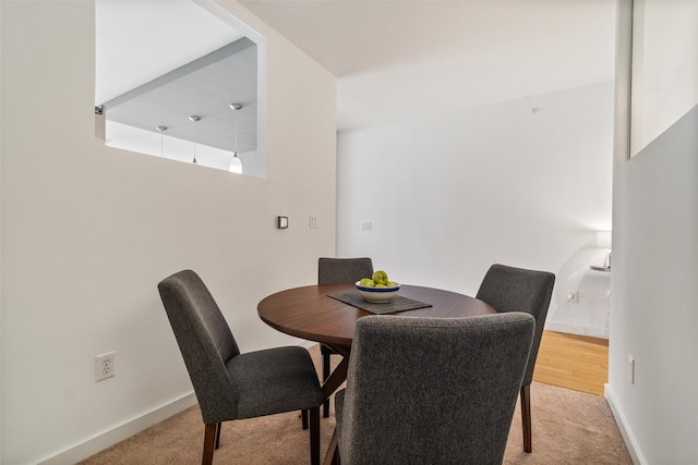 view of carpeted dining room