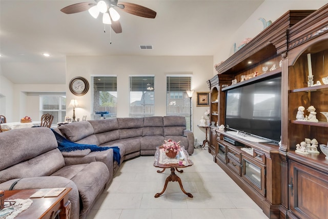 living room with light tile patterned floors and ceiling fan