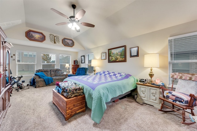 bedroom featuring ceiling fan, lofted ceiling, and light carpet