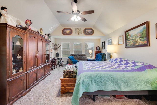 carpeted bedroom with lofted ceiling and ceiling fan