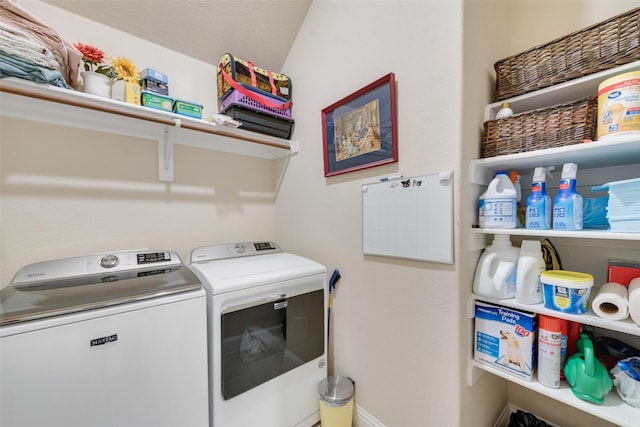 laundry room with washer and clothes dryer