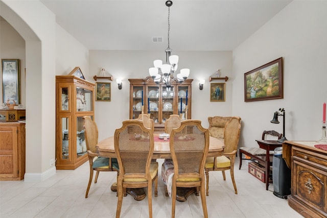 dining room with a chandelier