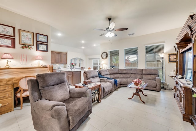 living room featuring sink and ceiling fan