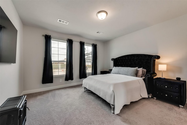 bedroom featuring carpet