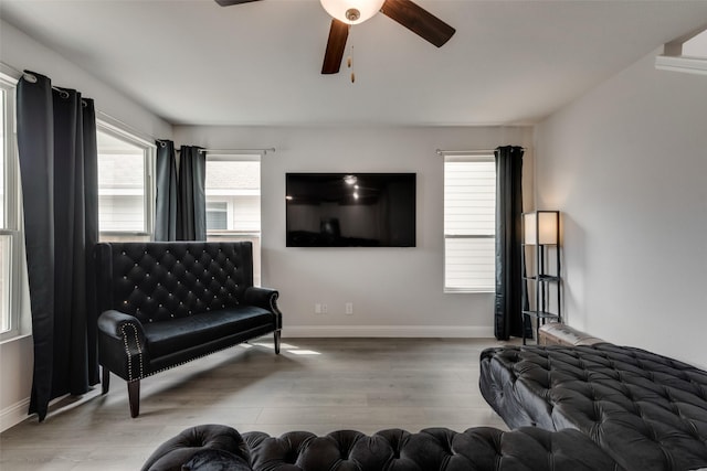 bedroom featuring ceiling fan and light hardwood / wood-style flooring