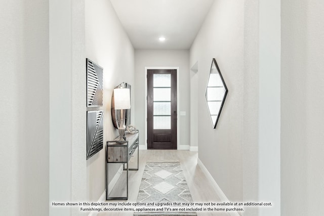 doorway featuring light hardwood / wood-style floors