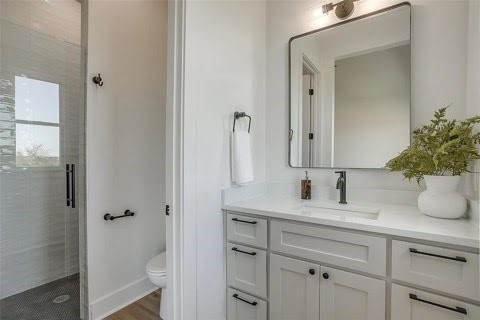 192 Top Flight Dr, Weatherford, TX 76087 - full bath with vanity, a stall shower, and toilet