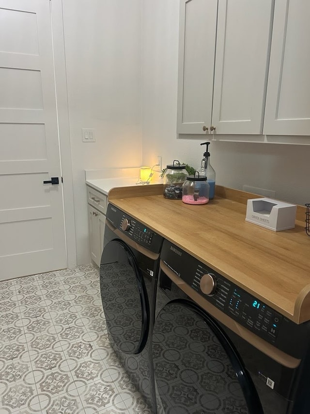 192 Top Flight Dr, Weatherford, TX 76087 - laundry area with washer and dryer, light tile patterned flooring, and cabinet space