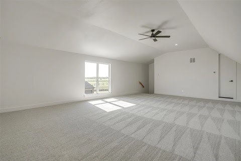 192 Top Flight Dr, Weatherford, TX 76087 - bonus room featuring ceiling fan, vaulted ceiling, visible vents, and light colored carpet