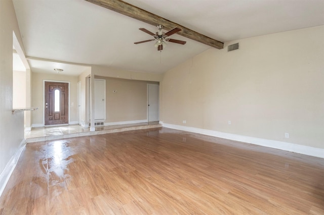 unfurnished living room with vaulted ceiling with beams, light hardwood / wood-style flooring, and ceiling fan