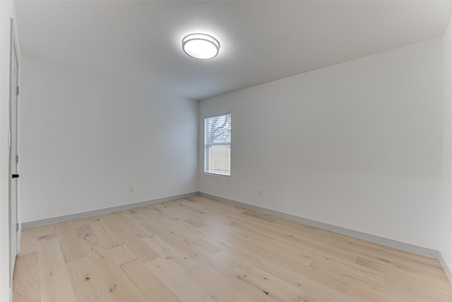 empty room featuring light hardwood / wood-style floors