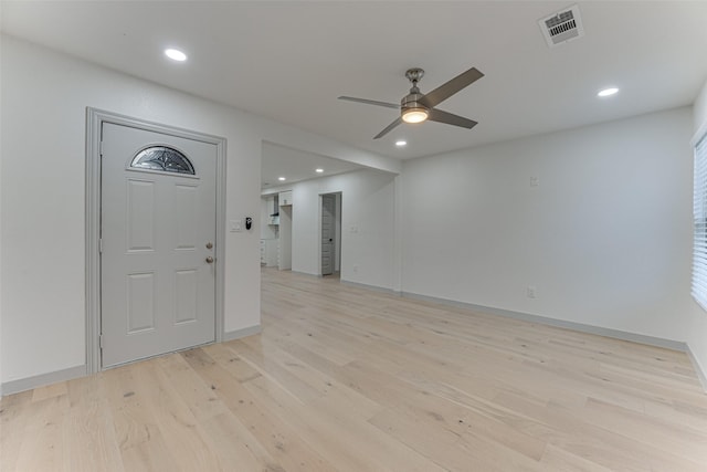 entryway with ceiling fan and light wood-type flooring