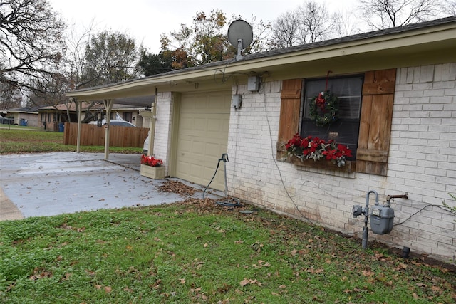 view of side of property with a lawn