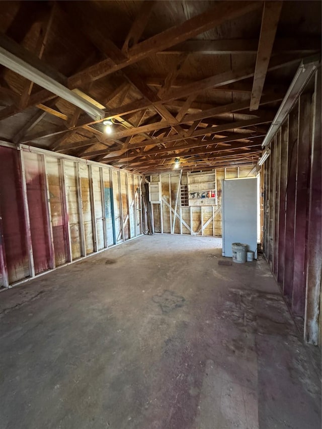 misc room with concrete flooring