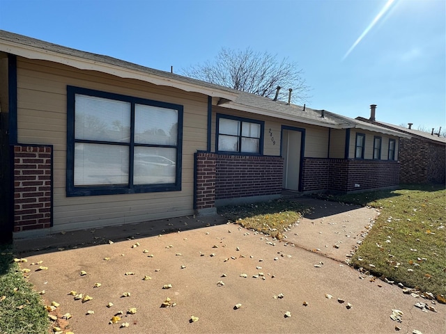 view of front of house with a patio area