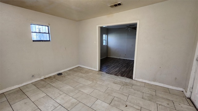 empty room featuring ceiling fan