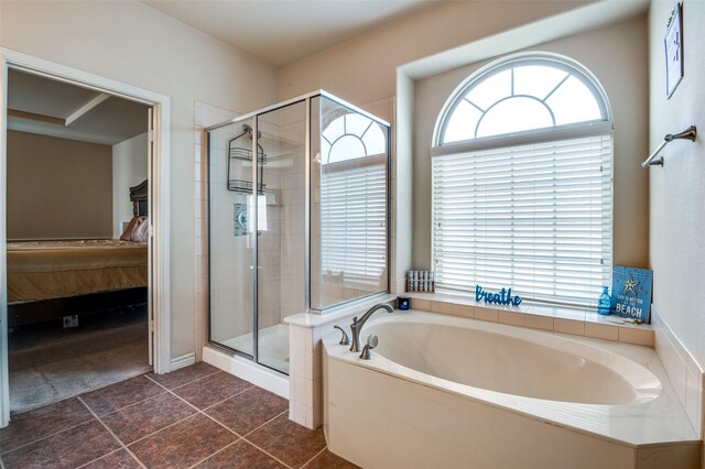 bathroom featuring tile patterned floors and plus walk in shower