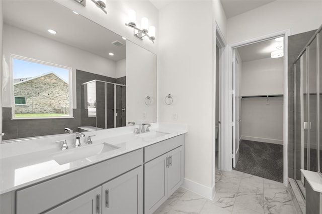 313 Slimp Blf, Azle, TX 76020 - full bathroom with a shower stall, double vanity, marble look tile flooring, a spacious closet, and recessed lighting