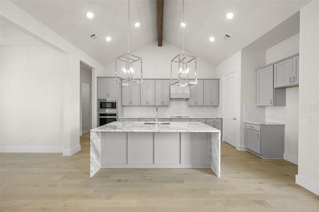 313 Slimp Blf, Azle, TX 76020 - kitchen with gray cabinetry, appliances with stainless steel finishes, beam ceiling, a chandelier, and a kitchen island with sink