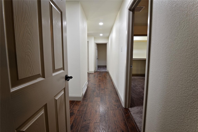 hall featuring dark wood-type flooring