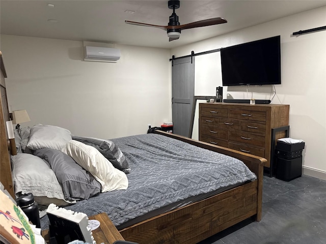 bedroom with a wall mounted air conditioner, a barn door, and ceiling fan