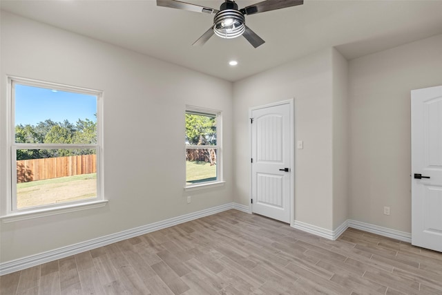 unfurnished bedroom featuring ceiling fan and light wood-type flooring