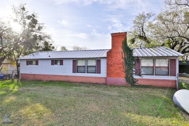 exterior space with a yard