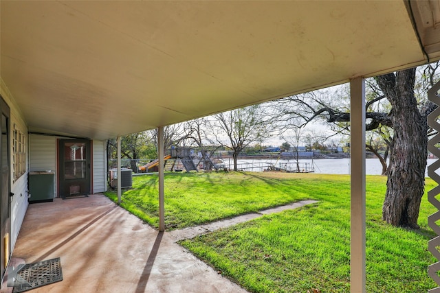 exterior space featuring a water view and central air condition unit