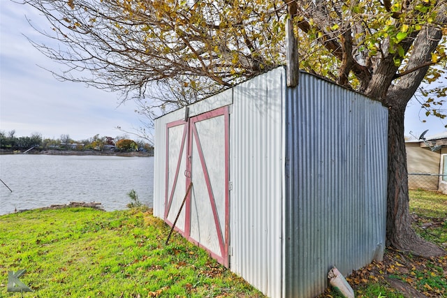 view of outdoor structure with a water view