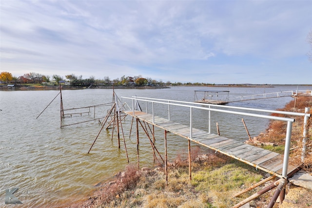 view of dock with a water view