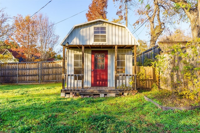 view of outdoor structure with a lawn