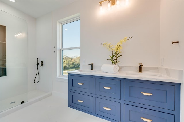 bathroom with a shower and vanity