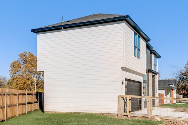 view of home's exterior featuring a yard