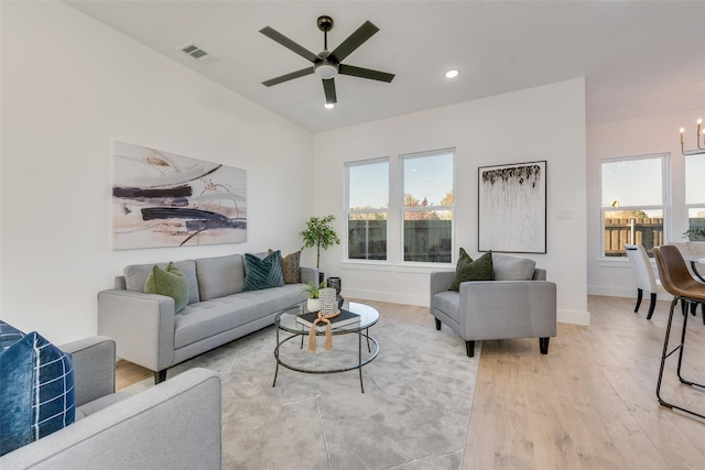 3919 Furey St, Dallas, TX 75212 - living area featuring light wood finished floors, healthy amount of natural light, ceiling fan, baseboards, and recessed lighting